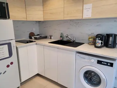 Cuisine ou kitchenette dans l'établissement LevelUp Disneyland Family