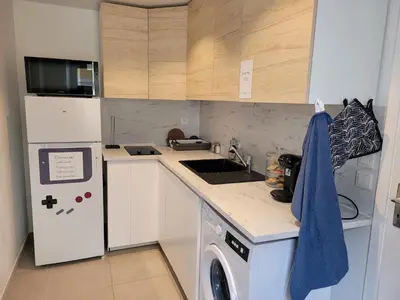 Cuisine ou kitchenette dans l'établissement LevelUp Disneyland Family