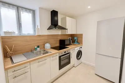 Cuisine ou kitchenette dans l'établissement Appartemple