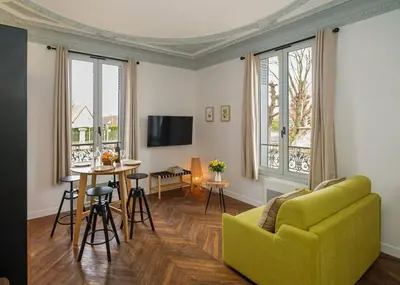 Télévision ou salle de divertissement dans l'établissement Villa Forestière Studio Le Châtaignier