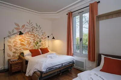 Un ou plusieurs lits dans un hébergement de l'établissement Villa Forestière Studio L'Acacia